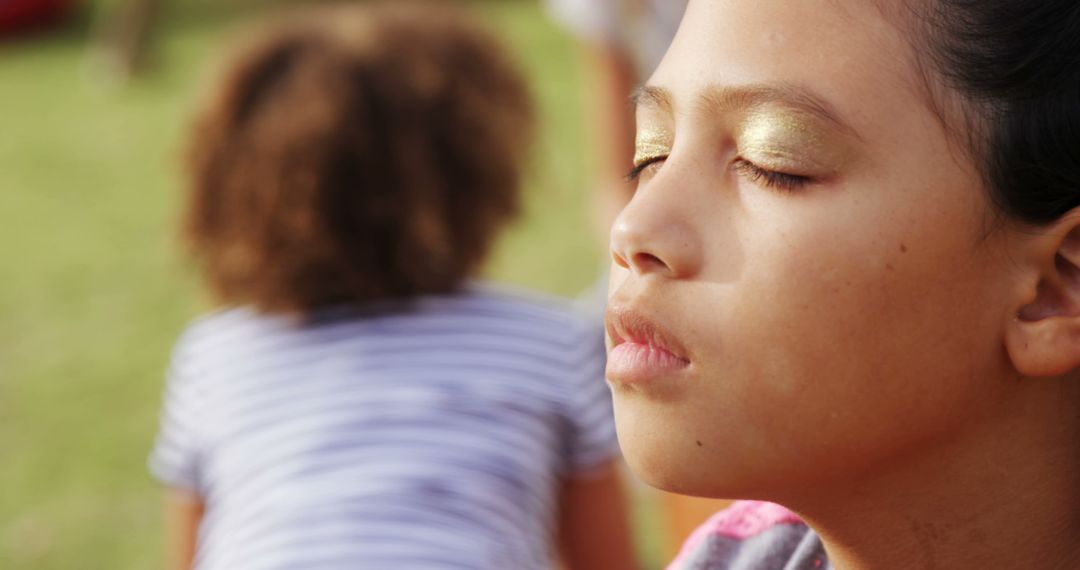 Peaceful Young Girl Meditating Outdoors - Free Images, Stock Photos and Pictures on Pikwizard.com