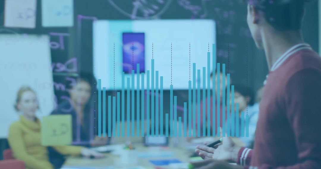 Business Team Analyzing Data Charts in Office Meeting Room
