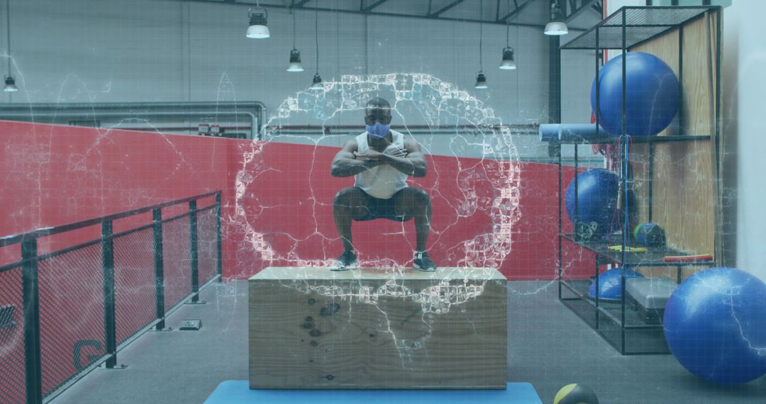 Athlete Practicing Box Jumps with Digital Brain Overlay in Gym