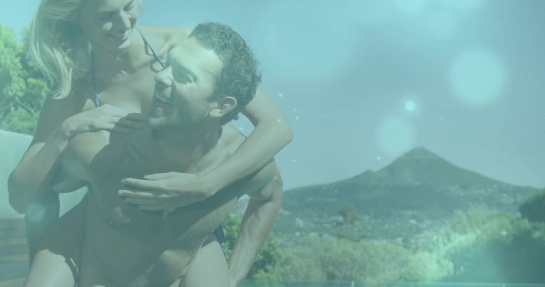 Couple Enjoying Poolside with Scenic Mountain in Background