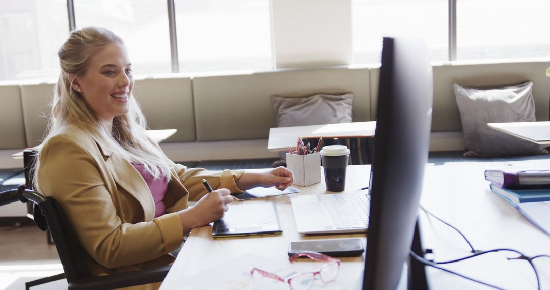 Businesswoman in Wheelchair Working in Bright Office Space