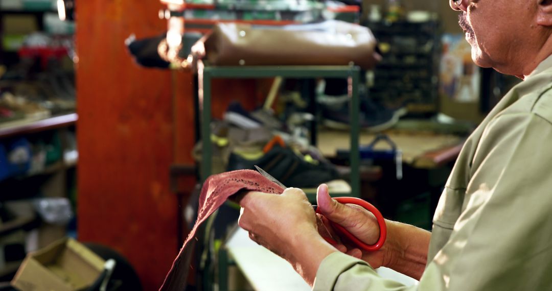 Leather Craftsman Cutting Material in Traditional Workshop - Free Images, Stock Photos and Pictures on Pikwizard.com