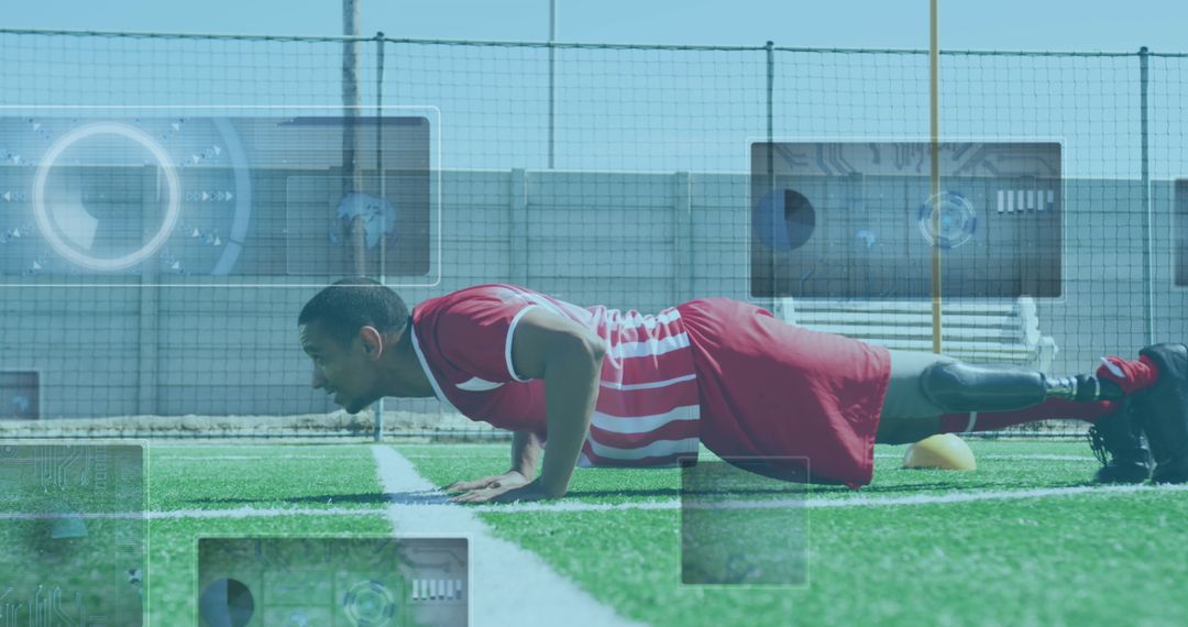 Football Player with Prosthetic Leg Doing Push-Ups with Digital Interface