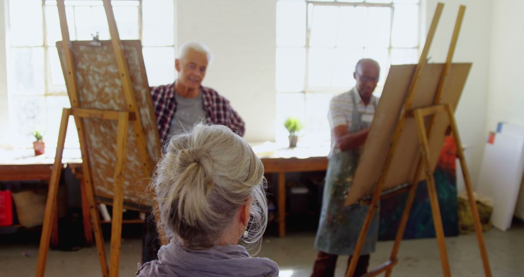 Senior Artists Painting in Studio - Free Images, Stock Photos and Pictures on Pikwizard.com