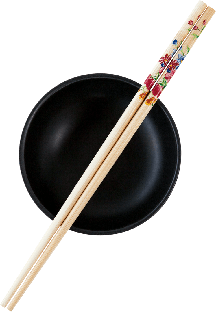 Transparent Close-Up of Decorative Chopsticks and Black Bowl