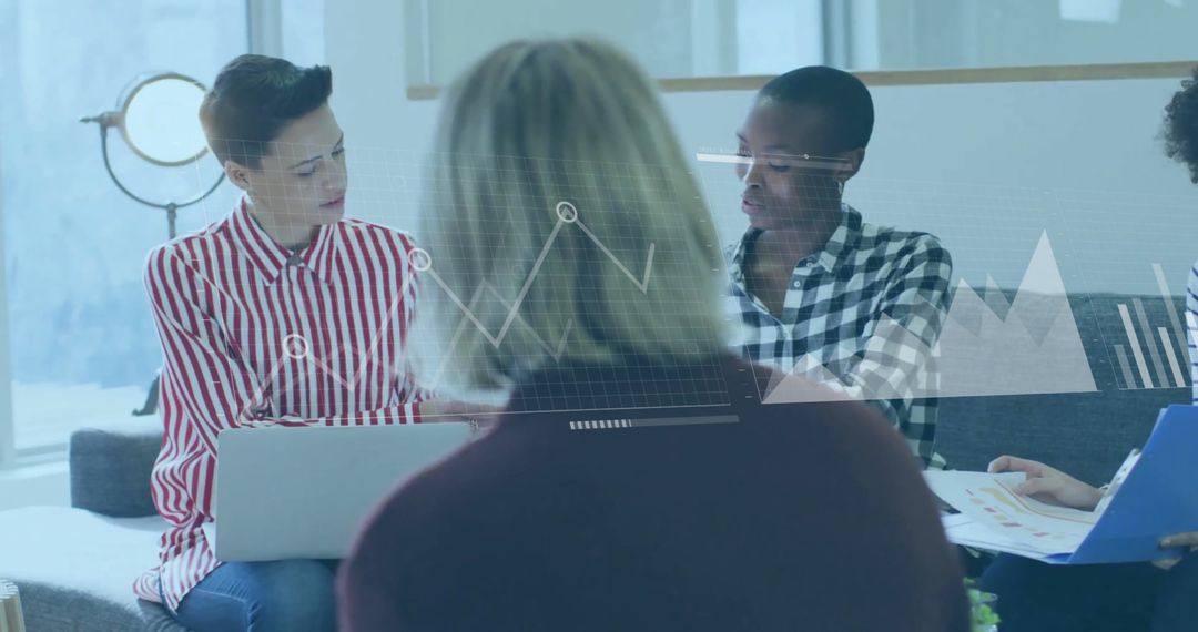 Business Team Collaborates on Financial Data Analysis in Modern Office