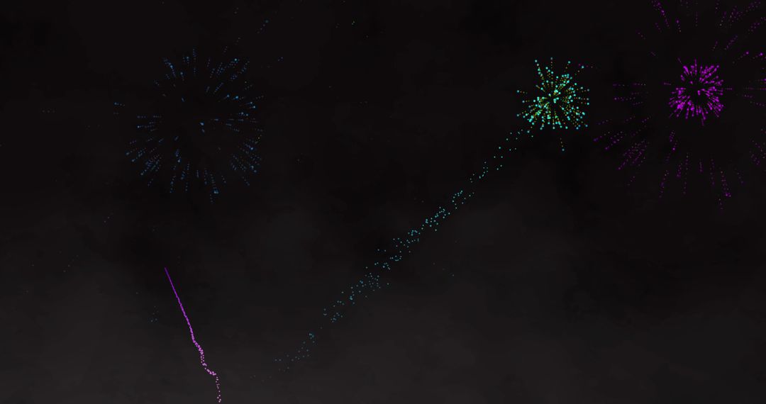 Vibrant Fireworks Exploding Against Black Night Sky