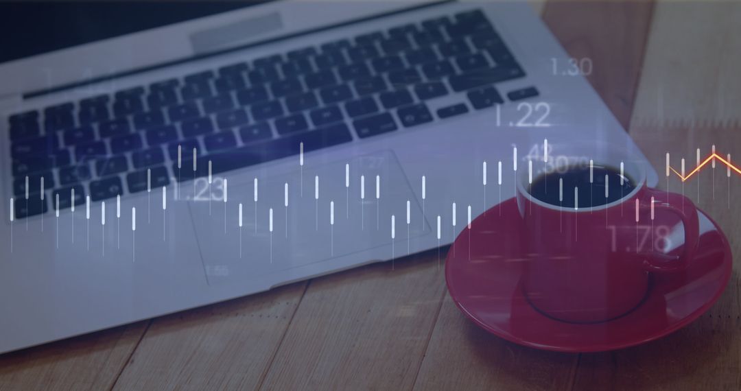 Financial Data Visualization on Laptop with Coffee Cup