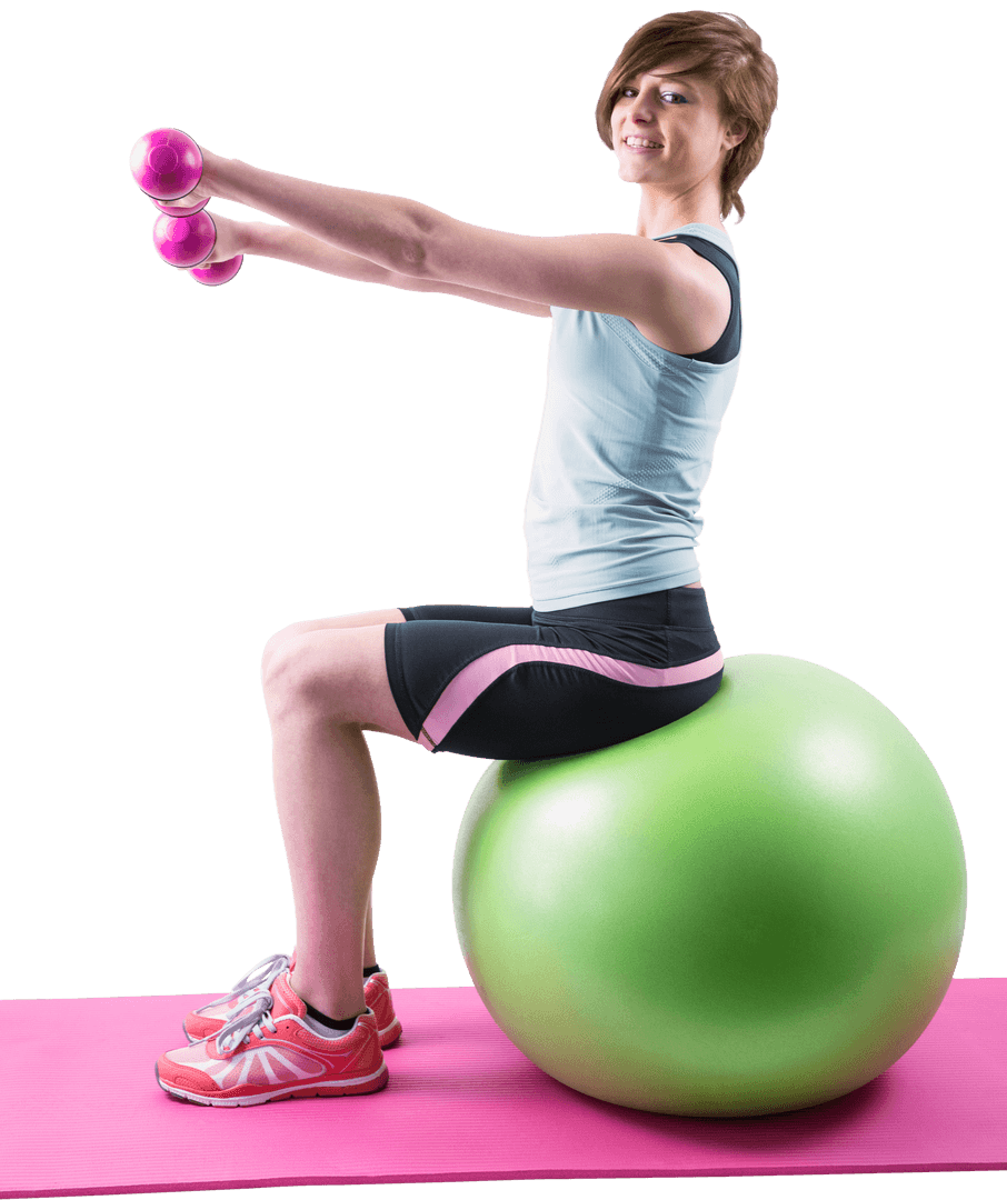 Brunette Exercising with Dumbbells on Transparent Fitness Ball