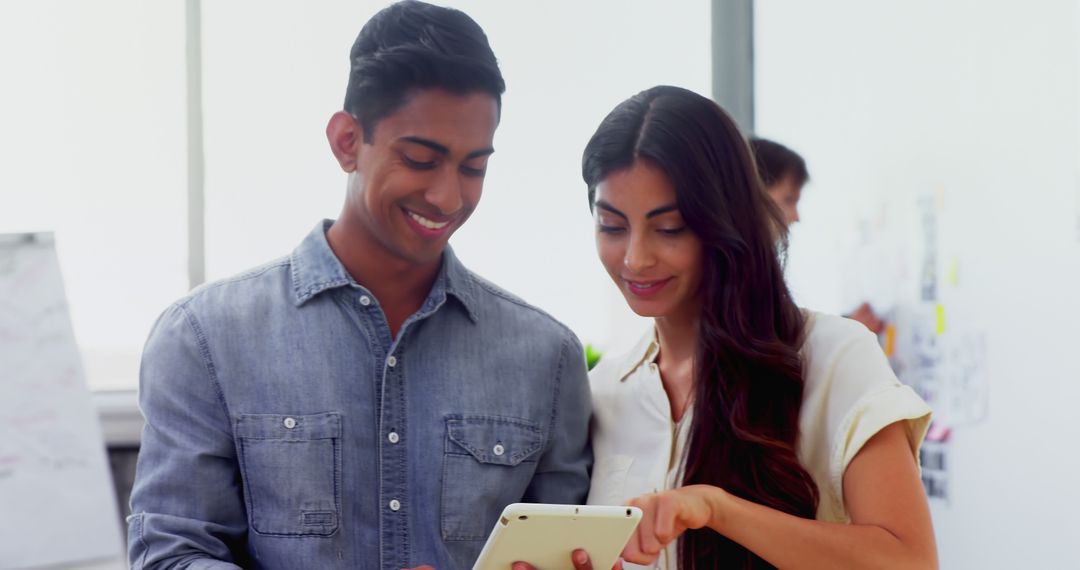 Young Professionals Collaborating Using Tablet Technology
