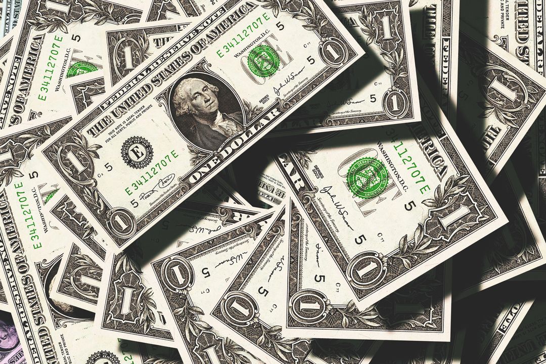 Abundant Pile of US Dollar Bills Financial Concept