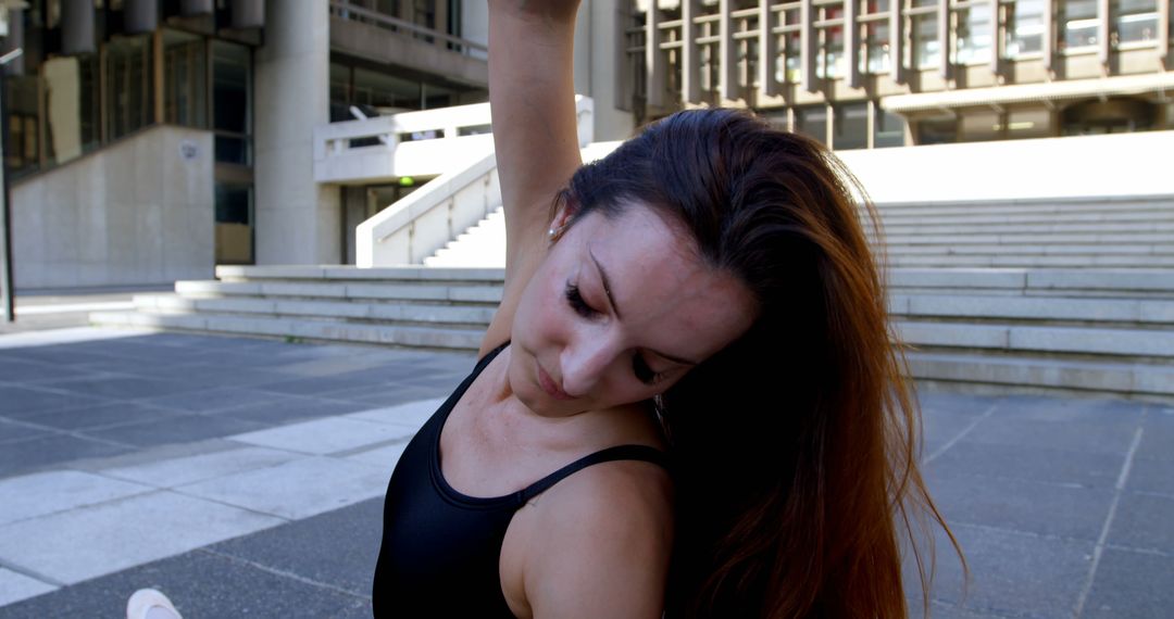 Woman Practicing Yoga Outdoors in Urban Environment - Free Images, Stock Photos and Pictures on Pikwizard.com