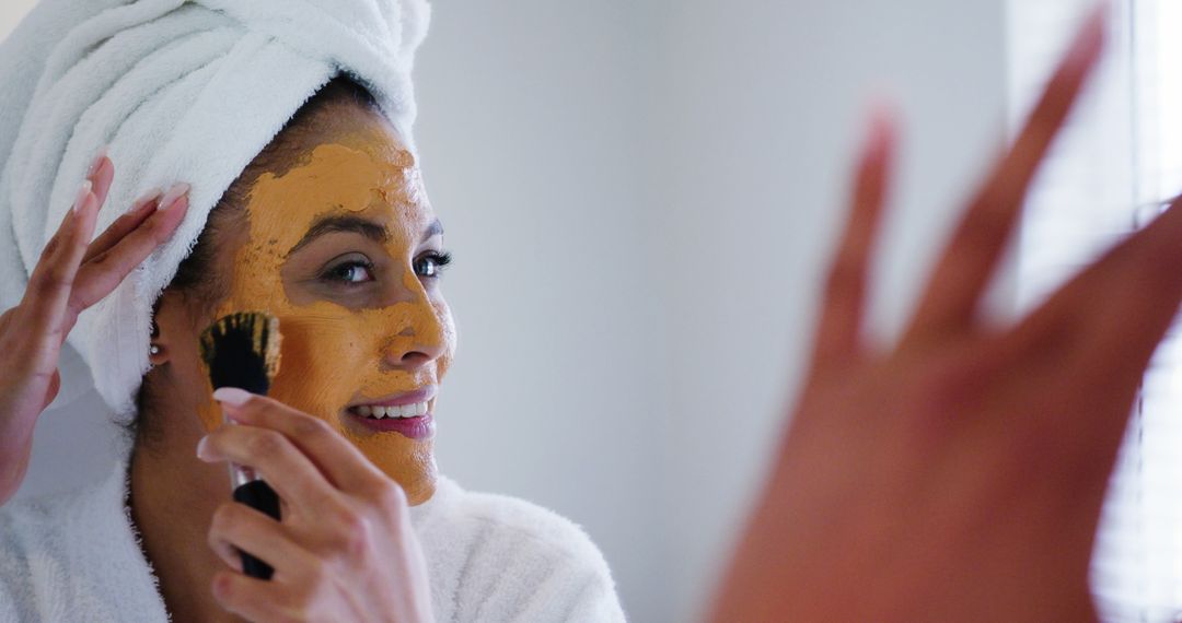 Woman Applying Face Mask in Wellness Routine at Home - Free Images, Stock Photos and Pictures on Pikwizard.com