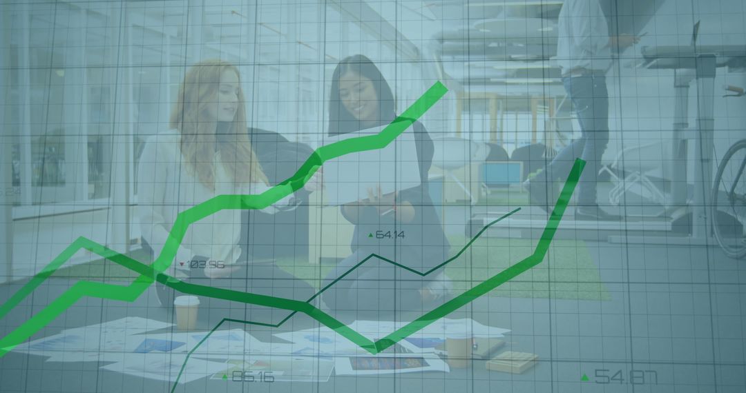 Financial Growth Chart Over Diverse Team Collaboration in Modern Office