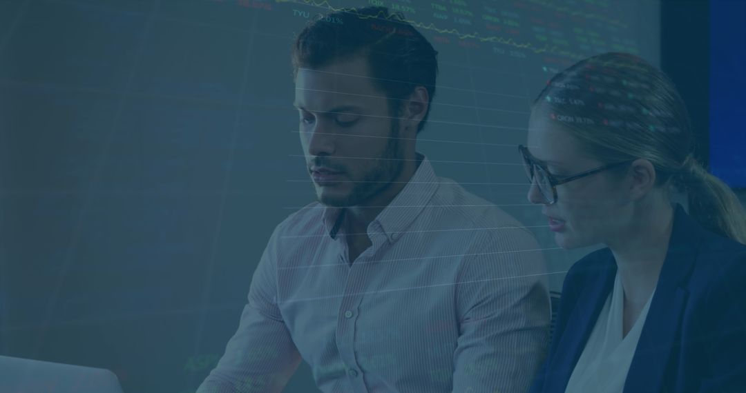 Colleagues Analyzing Stock Market Data with Technology Overlay