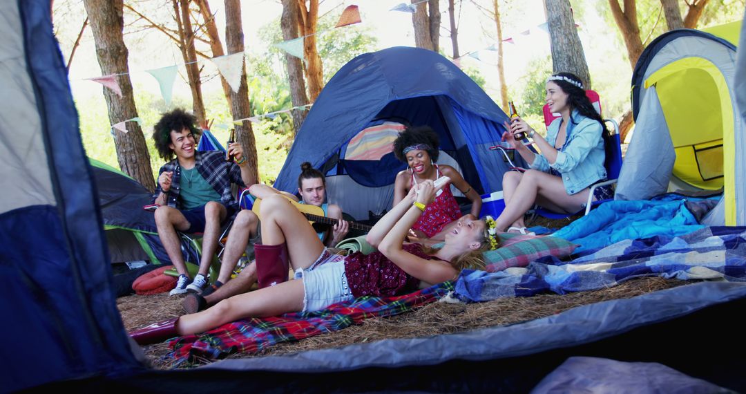 Group of Friends Enjoying Camping in Forest - Free Images, Stock Photos and Pictures on Pikwizard.com