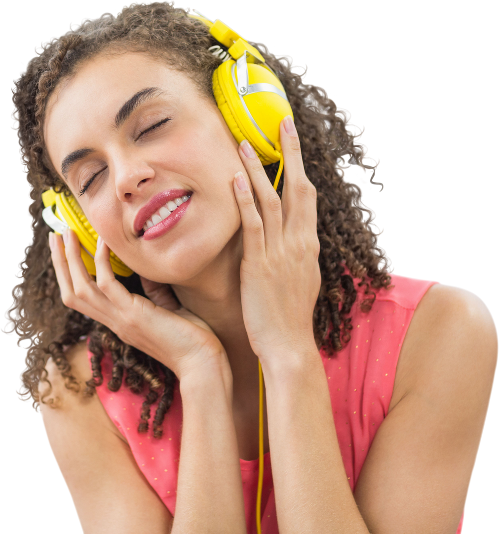 Transparent blissful young woman smiling listening to music with bright yellow headphones - Download Free Stock Images Pikwizard.com