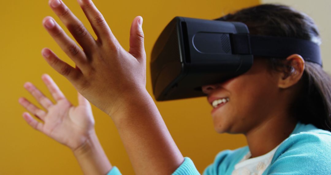 Excited Girl Experiencing Virtual Reality with VR Headset - Free Images, Stock Photos and Pictures on Pikwizard.com