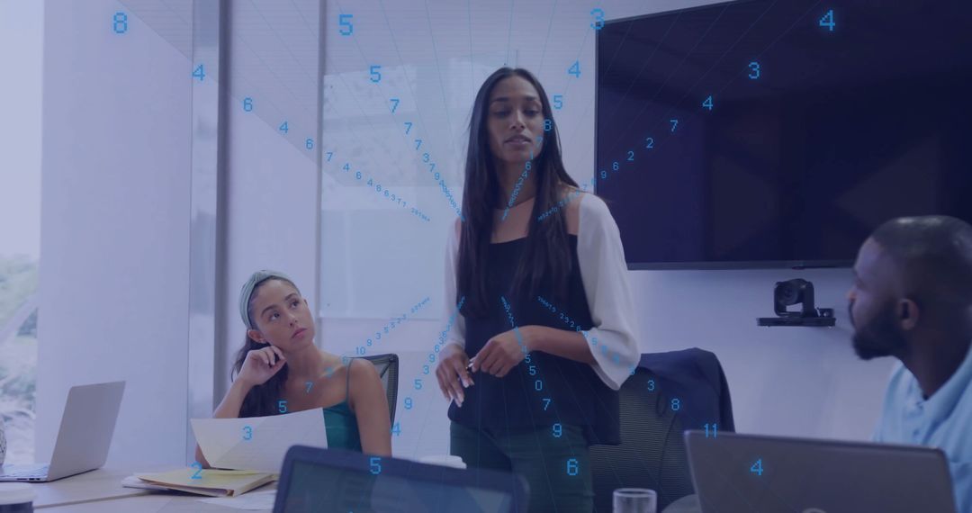 Businesswoman Presenting with Data Visualization at Modern Office Meeting