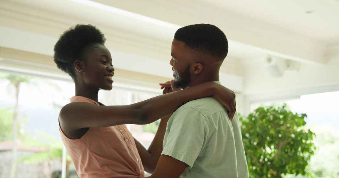 Couple Dancing Embracing Each Other Joy at Home