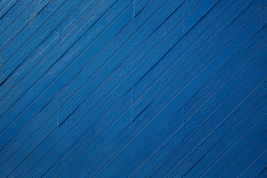 Vivid Diagonal Blue Wooden Planks Texture Creating Modern Backdrop for Design Projects