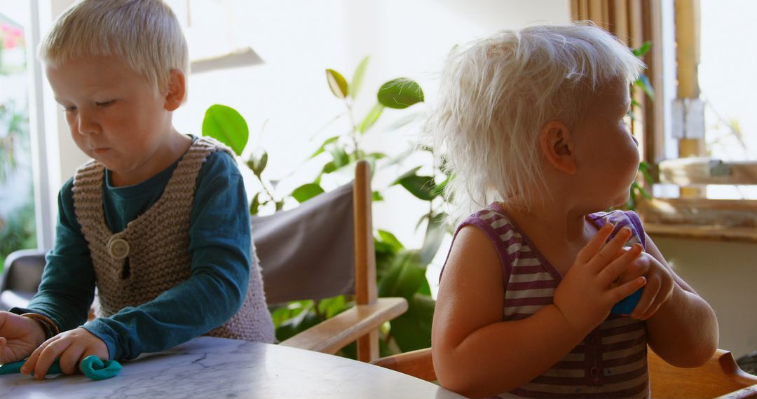 Children Engaged in Crafting with Colorful Clay at Home