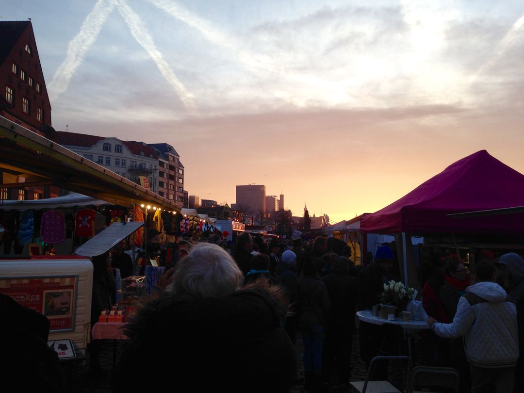 Busy Outdoor Market at Sunset with Crowds of Shoppers - Free Images, Stock Photos and Pictures on Pikwizard.com