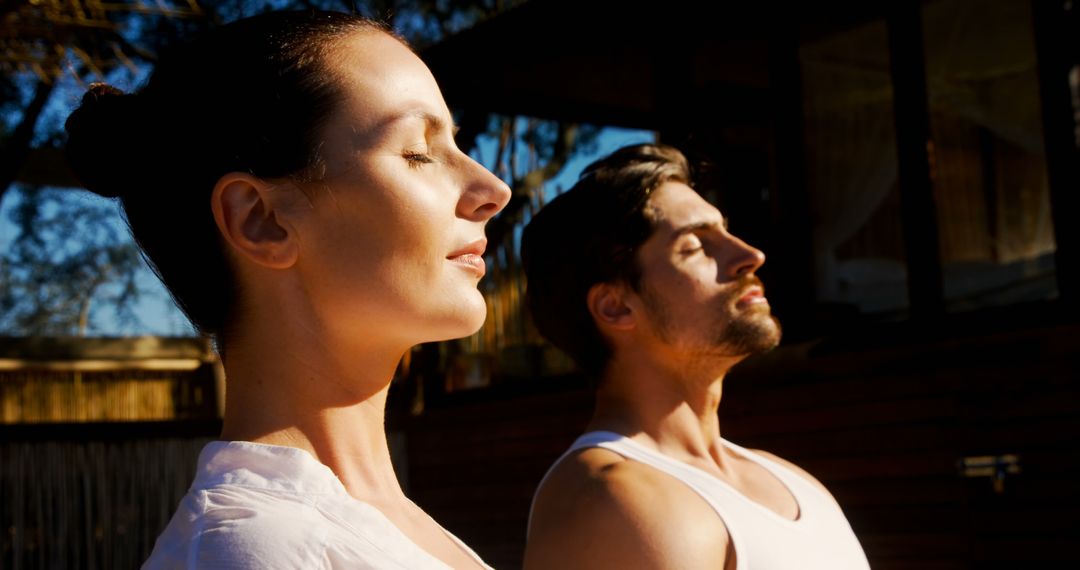Couple Practicing Outdoor Meditation in Serene Setting