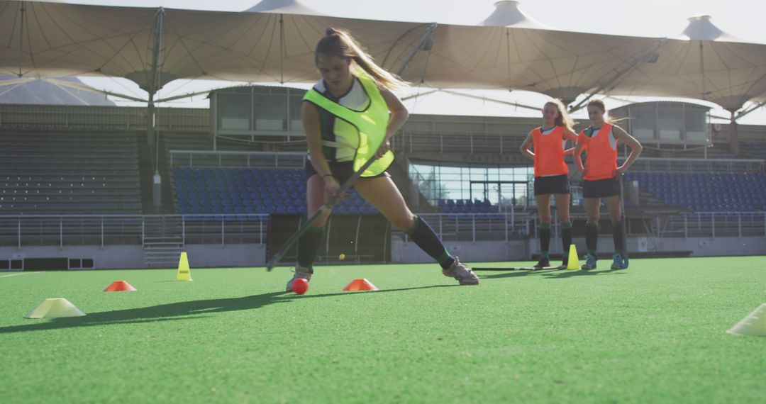 Female Field Hockey Team Training on Field With Cones - Free Images, Stock Photos and Pictures on Pikwizard.com