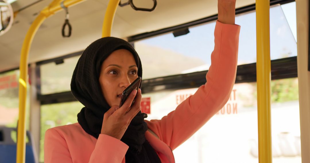 Confident Woman Speaking into Microphone while Riding Bus - Free Images, Stock Photos and Pictures on Pikwizard.com