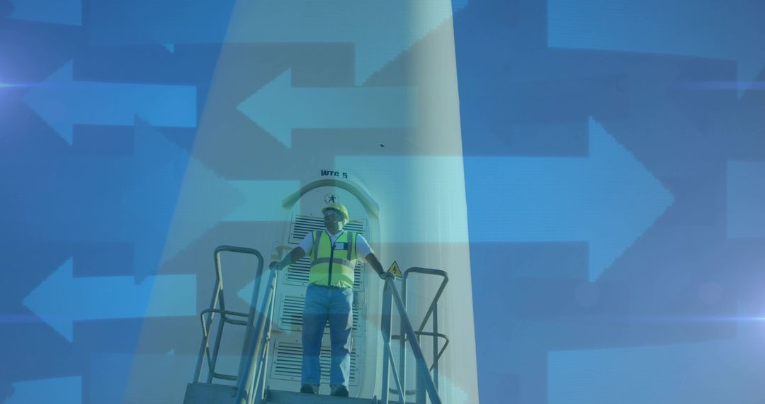 Wind Farm Technician at Turbine with Overlay of Digital Arrows