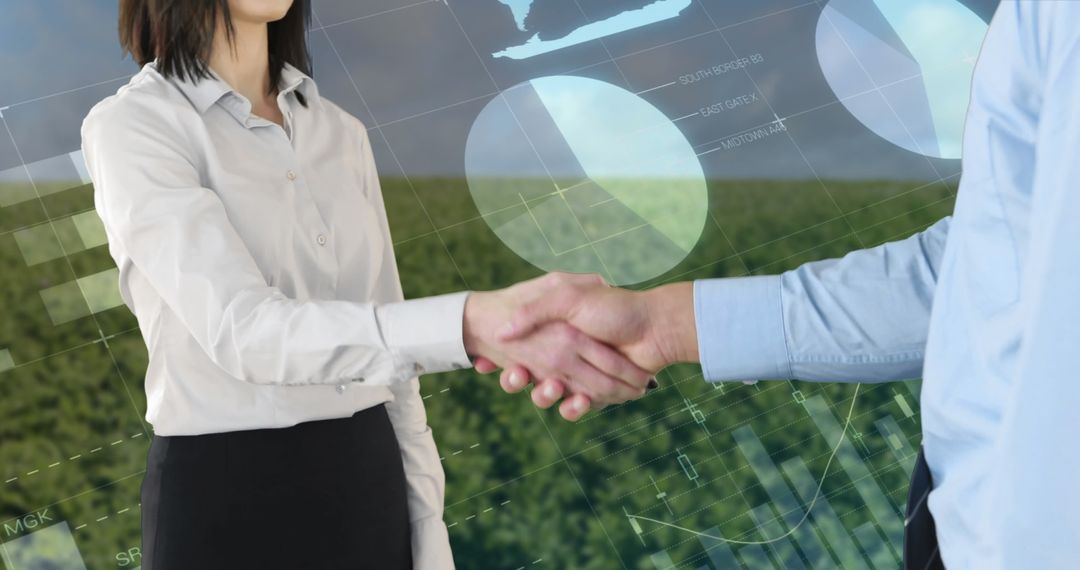 Business Partners Shaking Hands Over Digital Graph Background