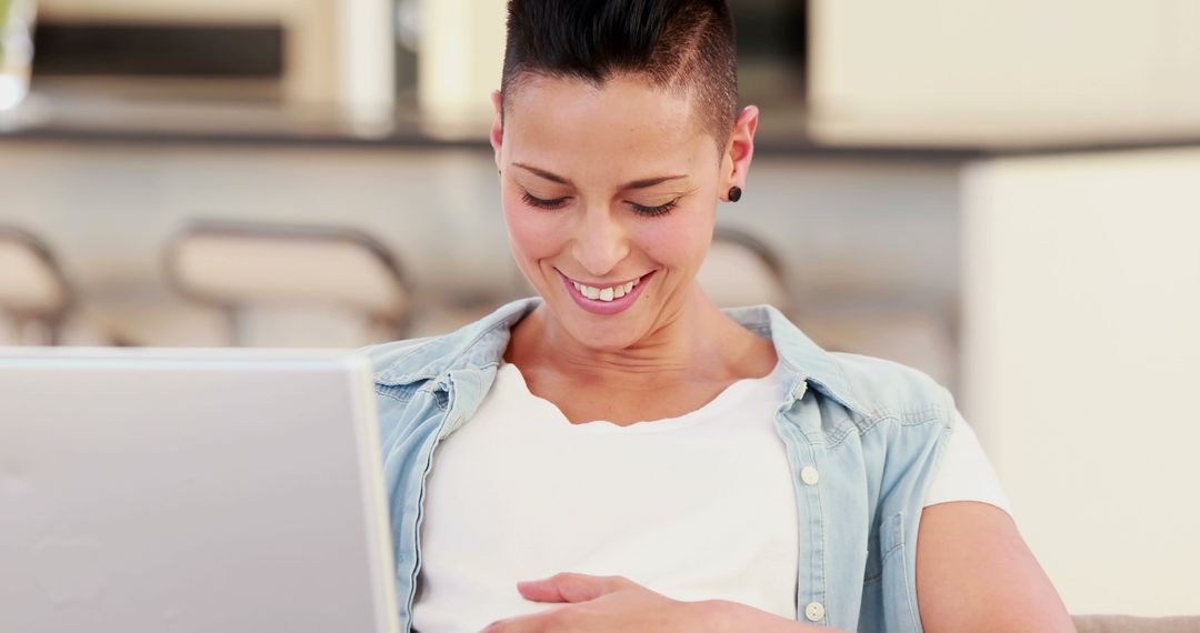 Expectant Mother Smiling While Using Laptop at Home - Free Images, Stock Photos and Pictures on Pikwizard.com