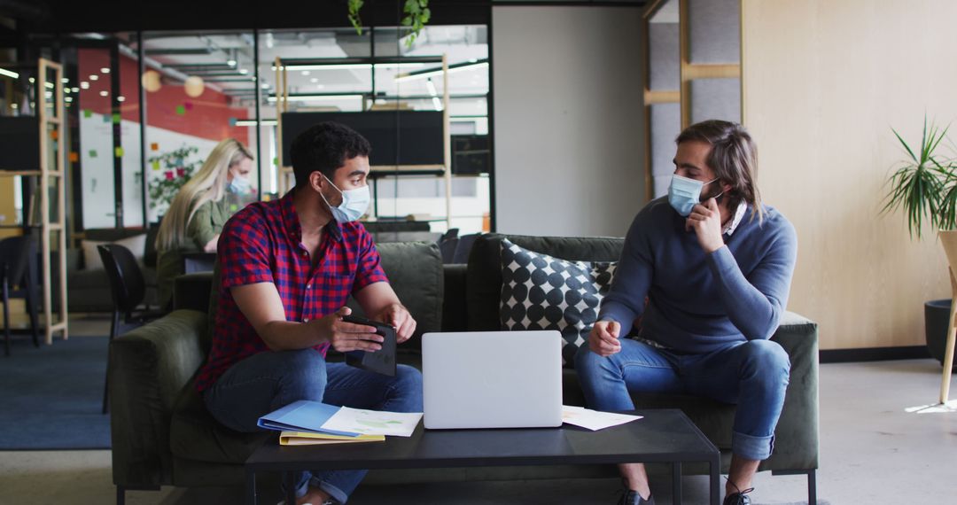 Collaborative Business Meeting with Precautions in Modern Office