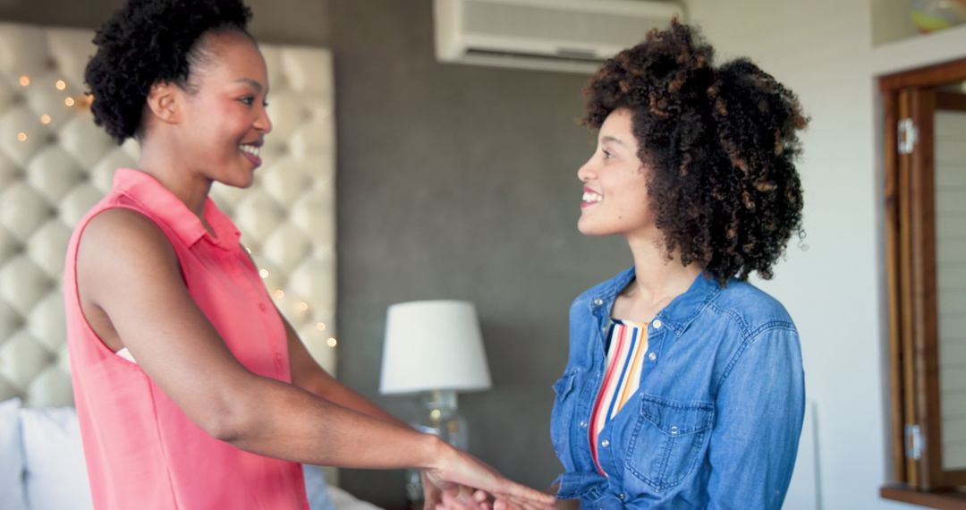 Friends Smiling and Holding Hands for Support and Unity