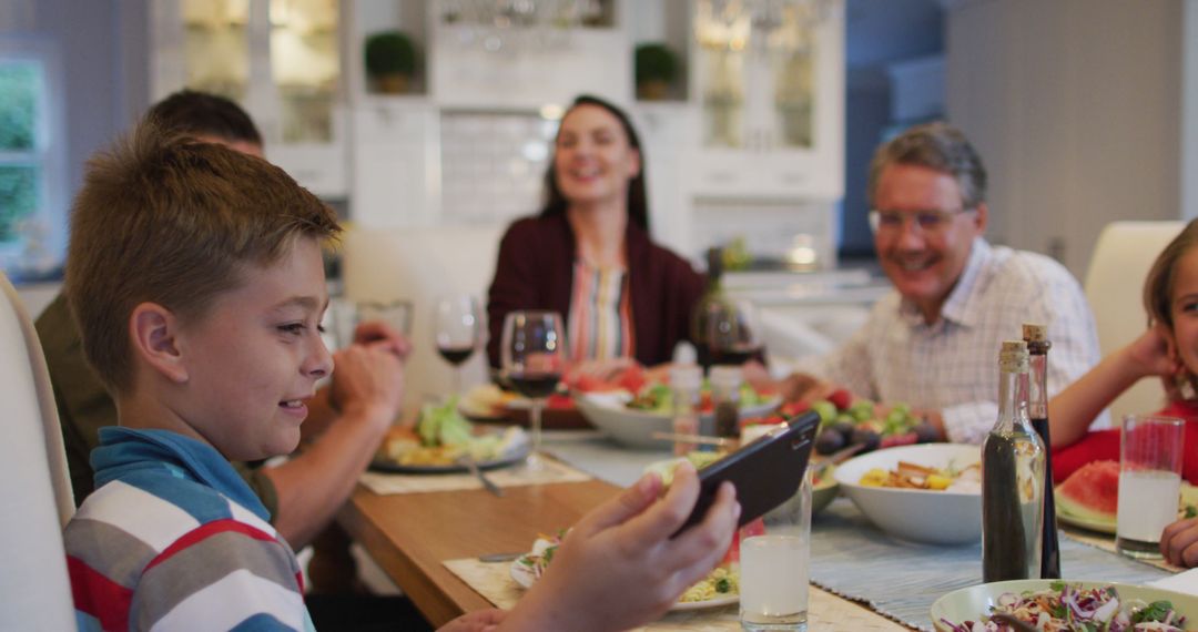 Family Enjoying Dinner Together while Taking a Selfie - Free Images, Stock Photos and Pictures on Pikwizard.com