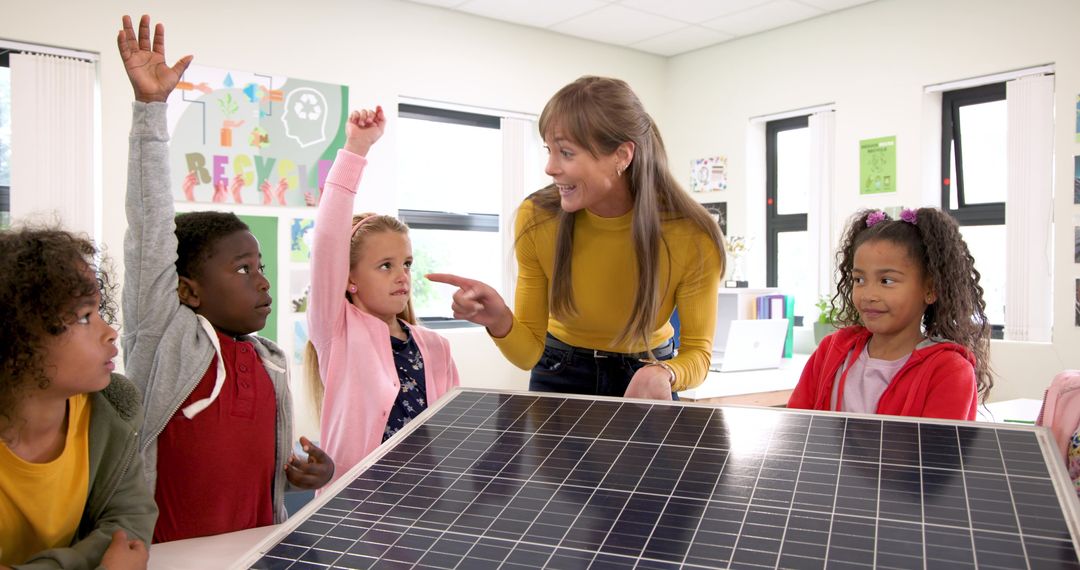 Elementary Classroom Exploring Solar Energy Panel With Teacher Guidance