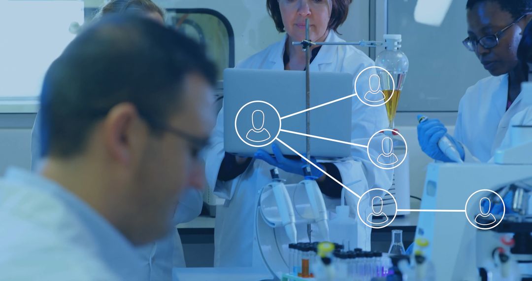 Female Scientists Collaborating with Technology in Modern Laboratory