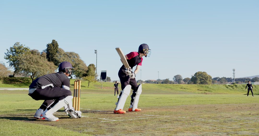 Batsman and Wicketkeeper Engaged in Dynamic Cricket Match