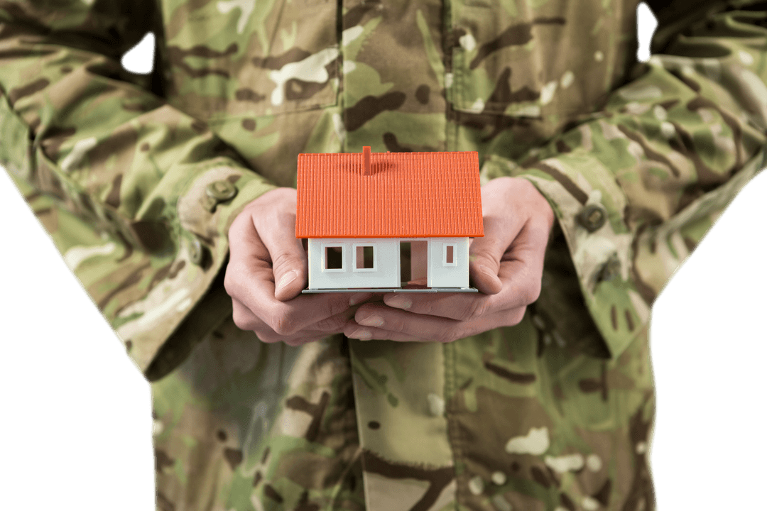 Transparent Model House Cupped by Soldier's Hands