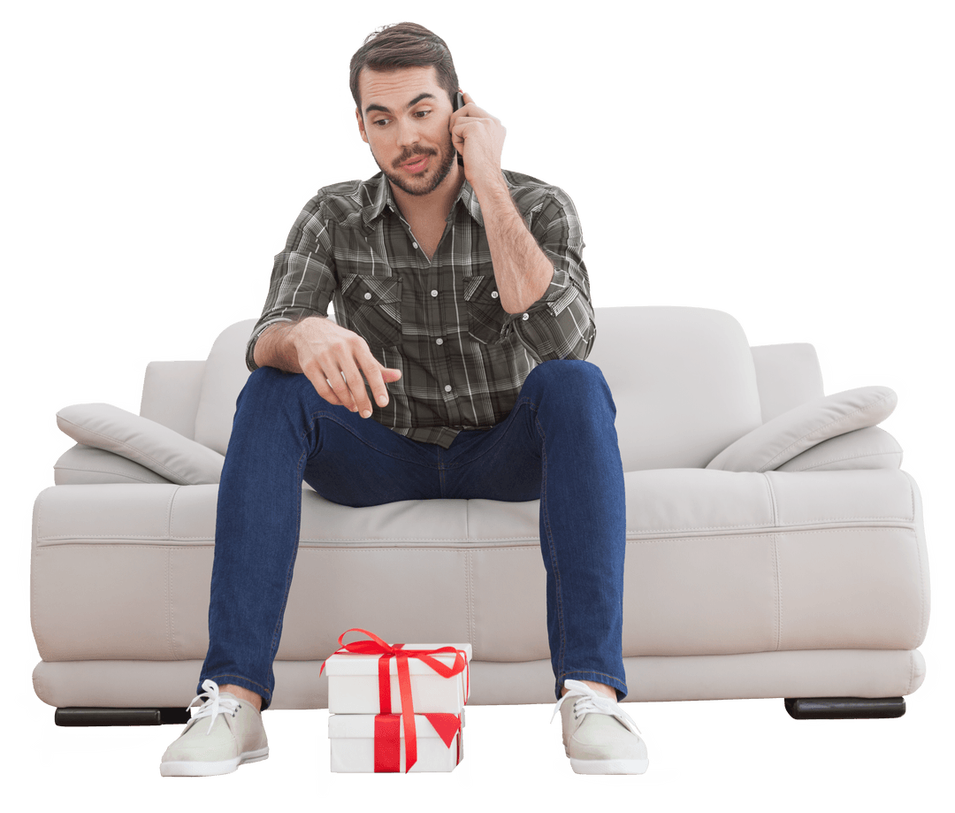 Man on Sofa Talking on Phone with Gift in Front, Transparent Background