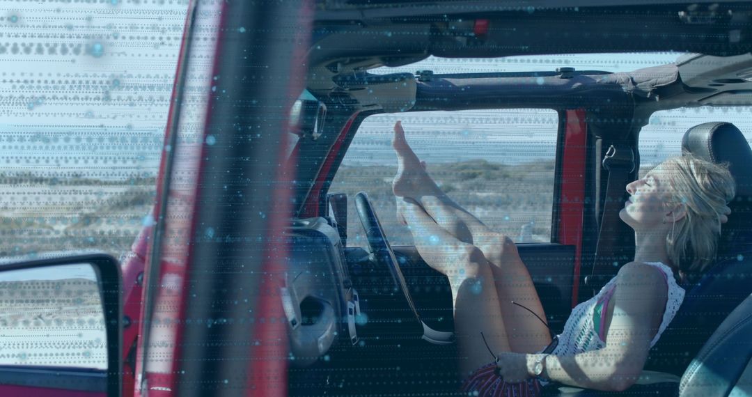 Female Traveler Relaxing in Red SUV on Coastal Roadside