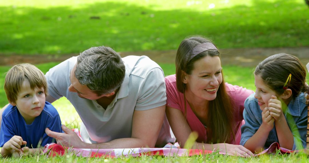 Happy Family Enjoying Picnic on a Sunny Day - Free Images, Stock Photos and Pictures on Pikwizard.com