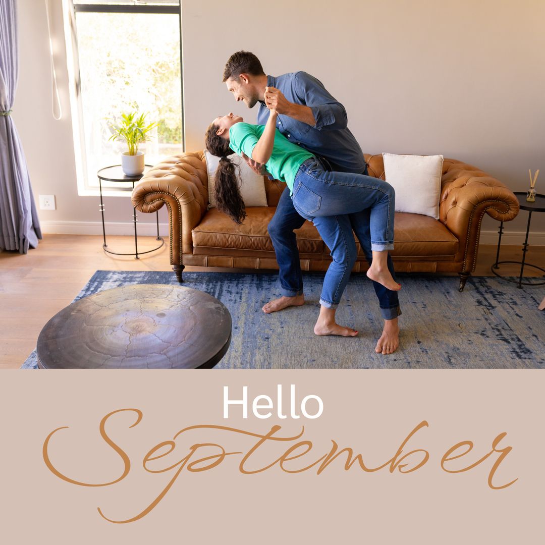 Couple Dancing Joyfully at Home, Welcoming September