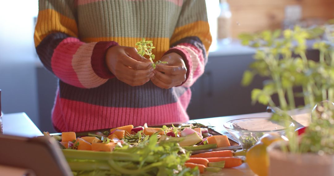 Person Preparing Fresh Vegetables in Bright Home Kitchen - Free Images, Stock Photos and Pictures on Pikwizard.com