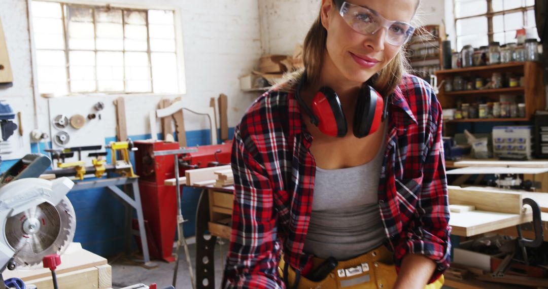 Confident Female Carpenter in Workshop Drawing Project Plans - Free Images, Stock Photos and Pictures on Pikwizard.com