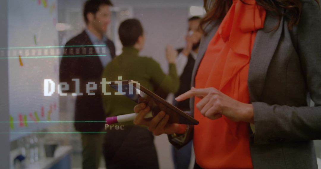 Modern Businesswoman Using Tablet in Collaborative Office Environment