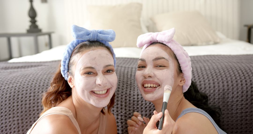 Young Friends Enjoying Skincare Routine at Home