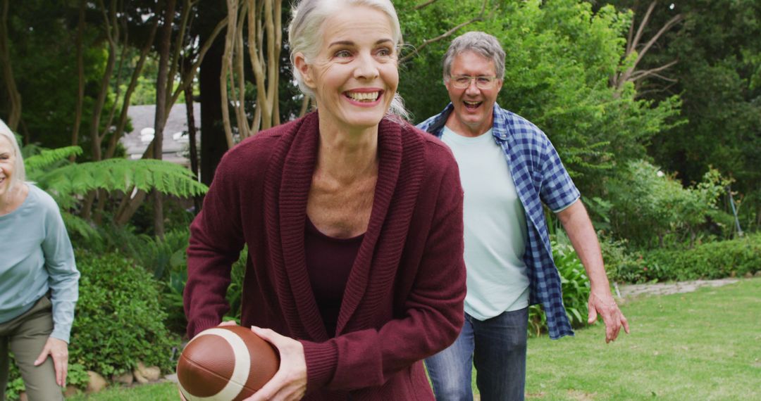 Seniors Playing Football Outdoors and Having Fun - Free Images, Stock Photos and Pictures on Pikwizard.com