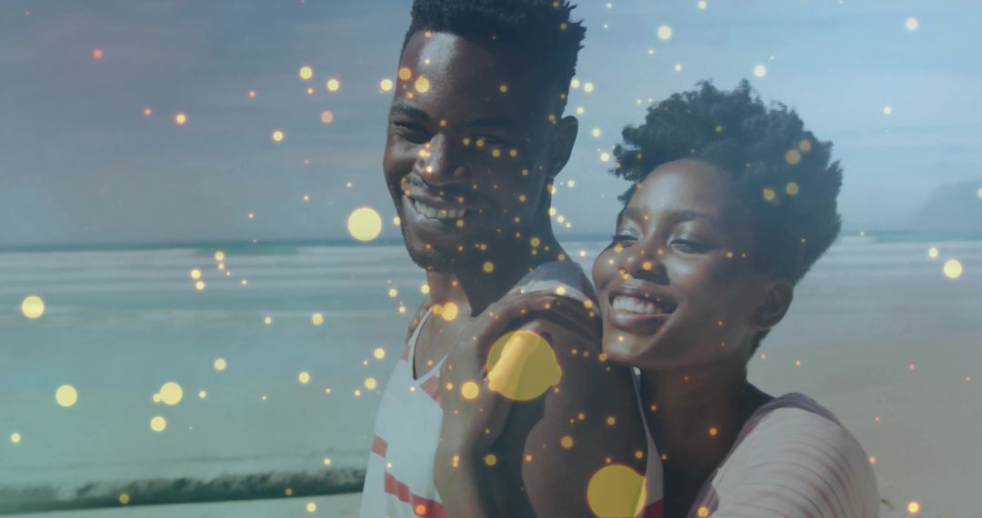Smiling Couple Enjoying Romantic Beach Moment with Golden Bokeh